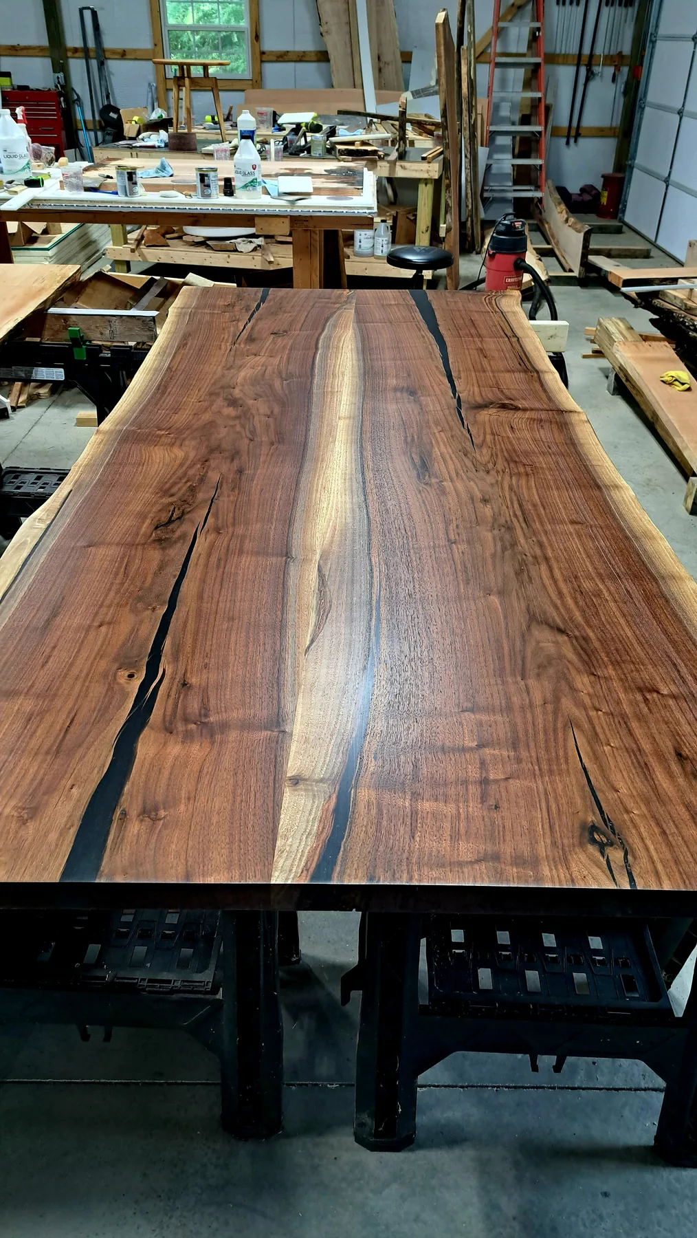 family walnut table from their tree behind the build photo 12