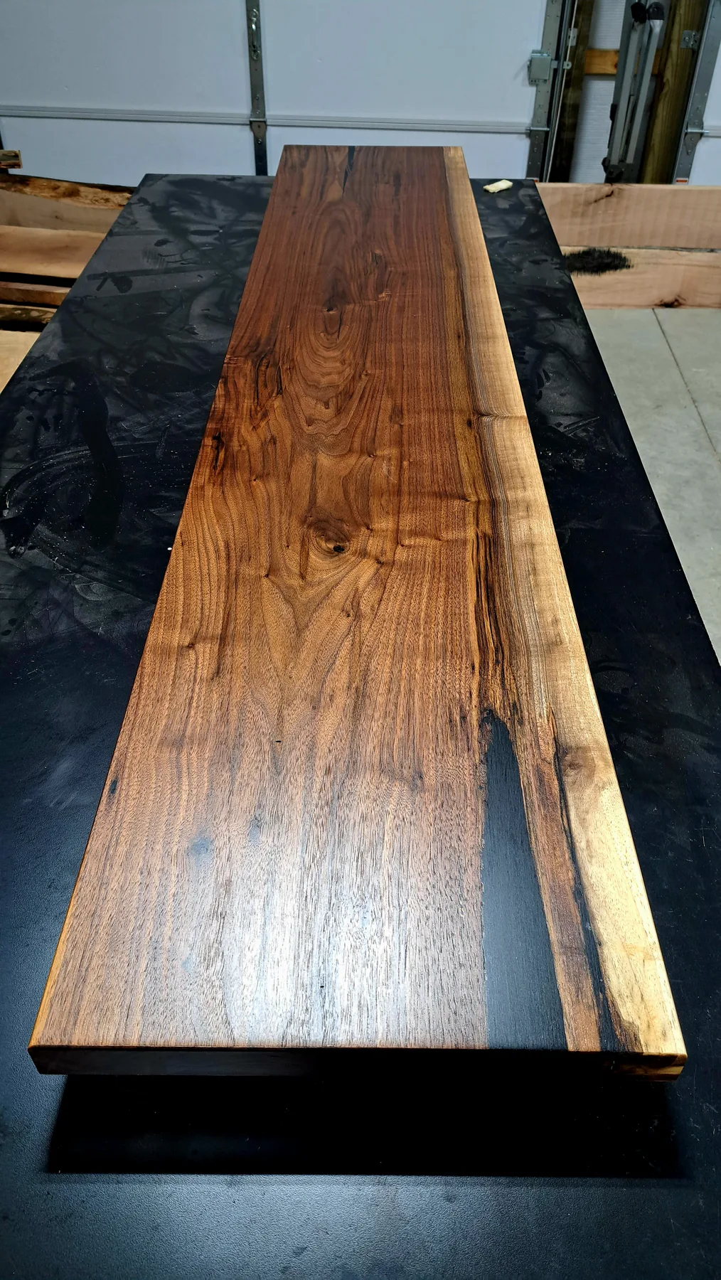 family walnut table from their tree behind the build photo 14