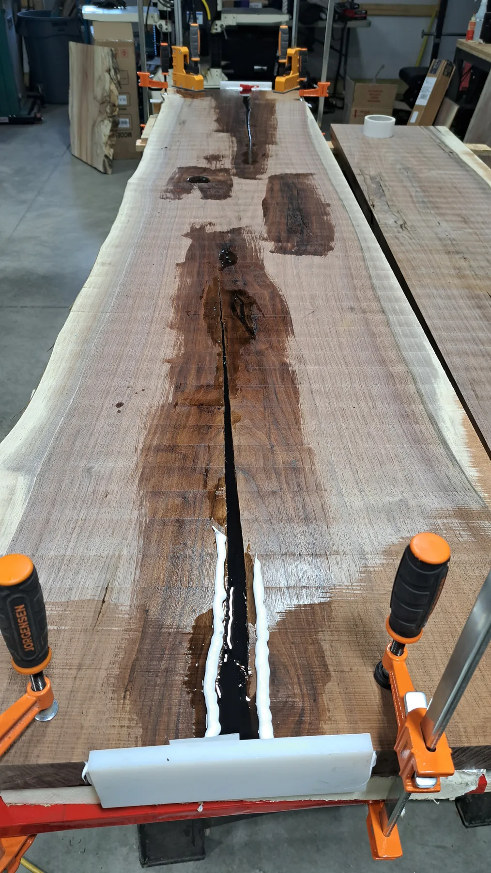 family walnut table from their tree behind the build photo 6