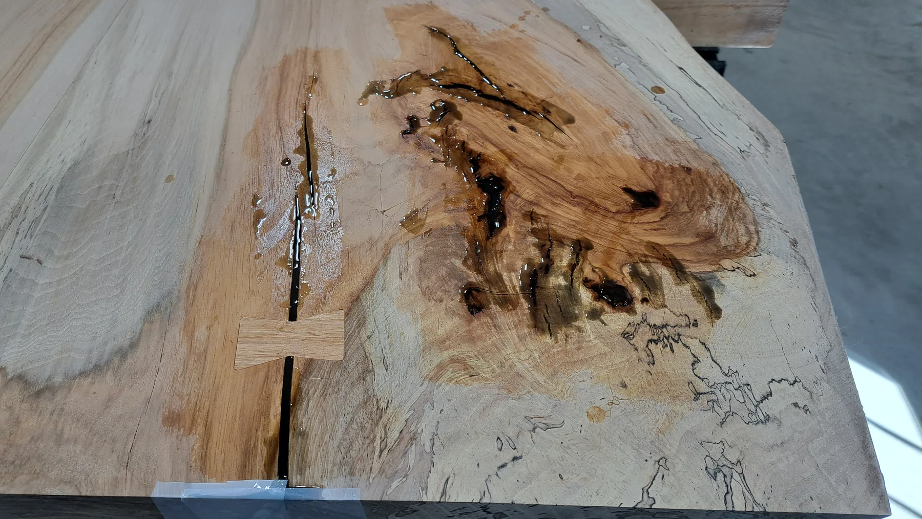 historic pecan dining table behind the build photo 10